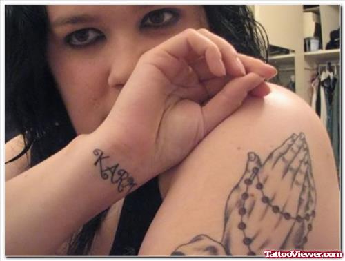 Grey Ink Praying Hands Tattoos On Left Shoulder