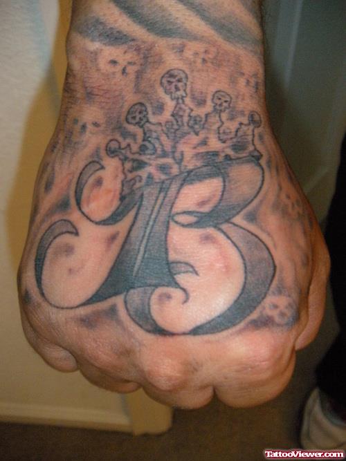 Grey Ink Hand Tattoo