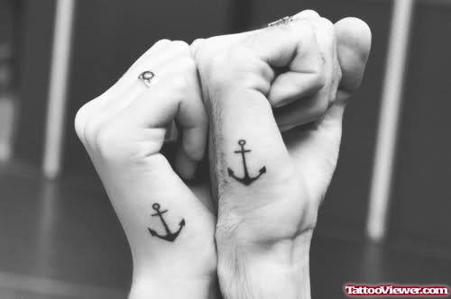 Black Ink Tiny Anchor Tattoos On Hands