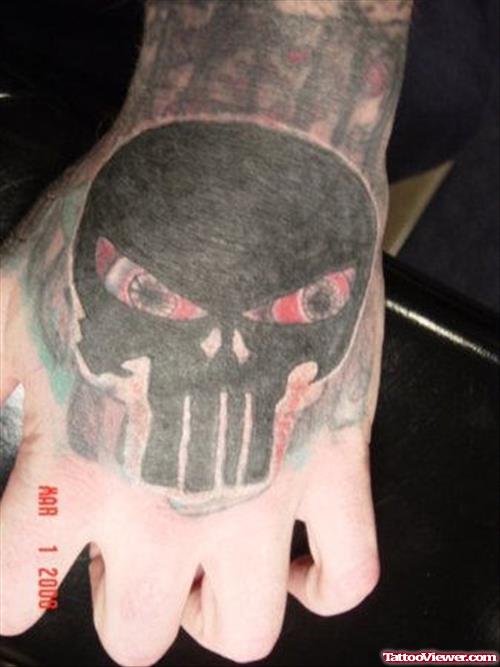 Black Ink Skull Hand Tattoo