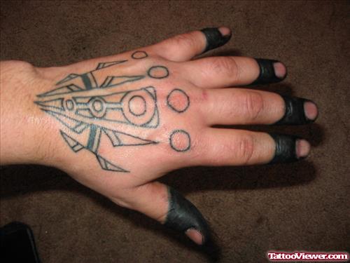 Black Ink Left Hand Tattoo