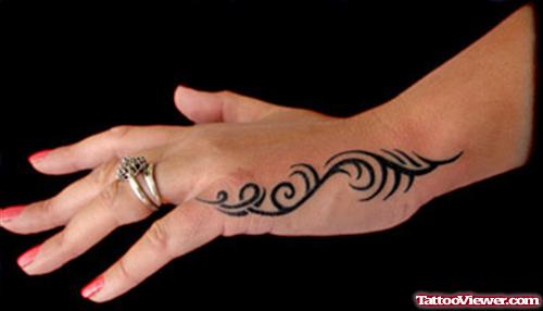 Amazing Tribal Tattoo On Girl Left Hand