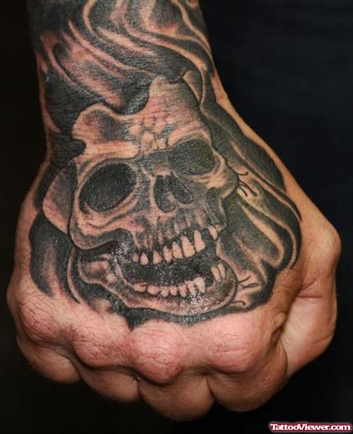 Grey Ink Skull Right Hand Tattoo