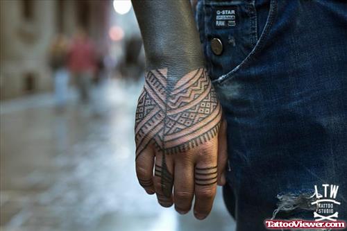 Black Ink Maori Hand Tattoo