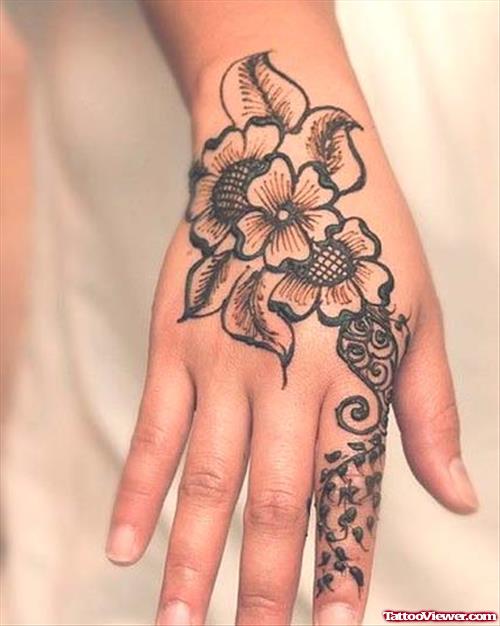 Amazing Grey Ink Flowers Hand Tattoo