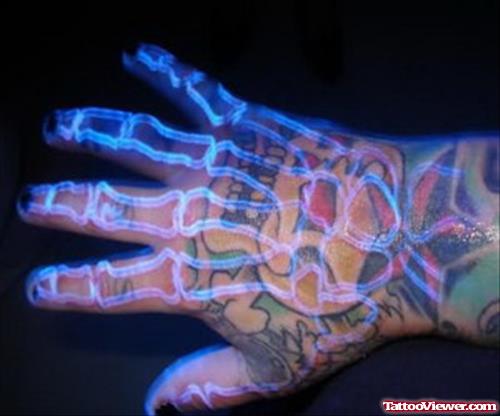 Skull and Black Light Skeleton Hand Tattoo