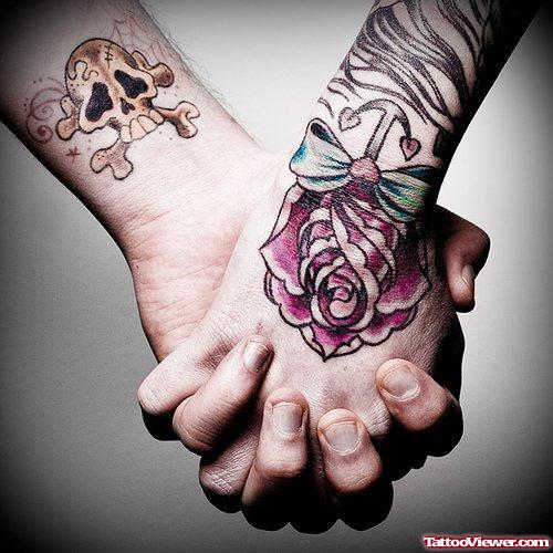 Red Rose Flower And Bow Hand Tattoos