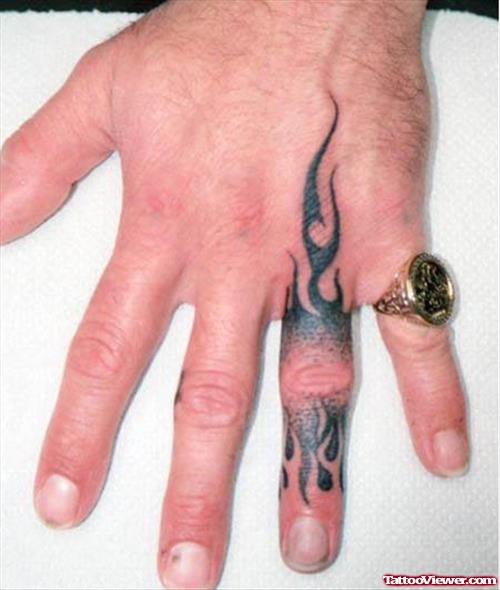 Cool Black Tribal Flame Hand Tattoo