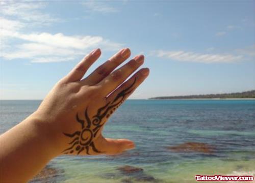 Amazing Tribal Sun Hand Tattoo