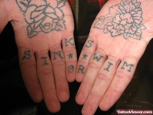 Grey Ink Flowers Hand Tattoo
