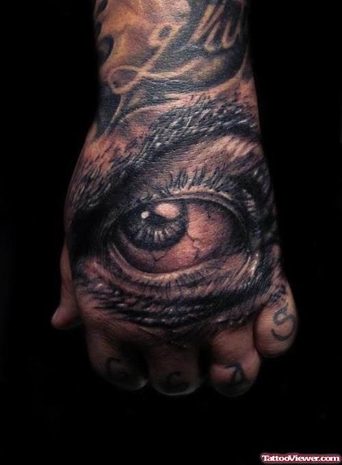 Grey Ink 3D Eye Tattoo On Left Hand