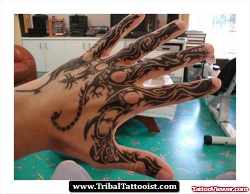Amazing Black Tribal Tattoo On Left Back Hand