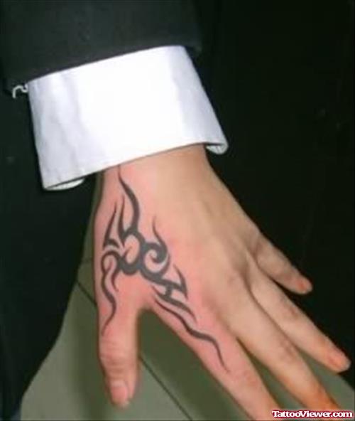 Small Tribal Hand Tattoo