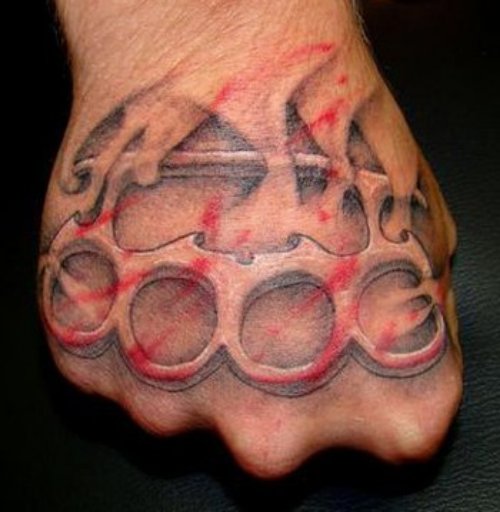 Knuckles Hand Tattoo