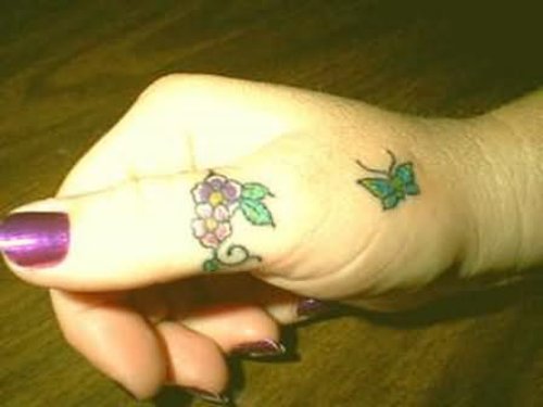 Green Butterfly And Flowers Tattoos On Right Hand