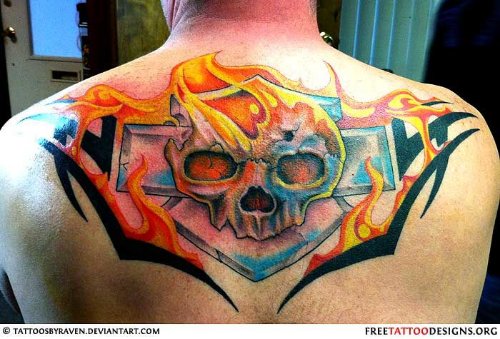 Colorful Tribal And Skull Harley Tattoo On Upperback