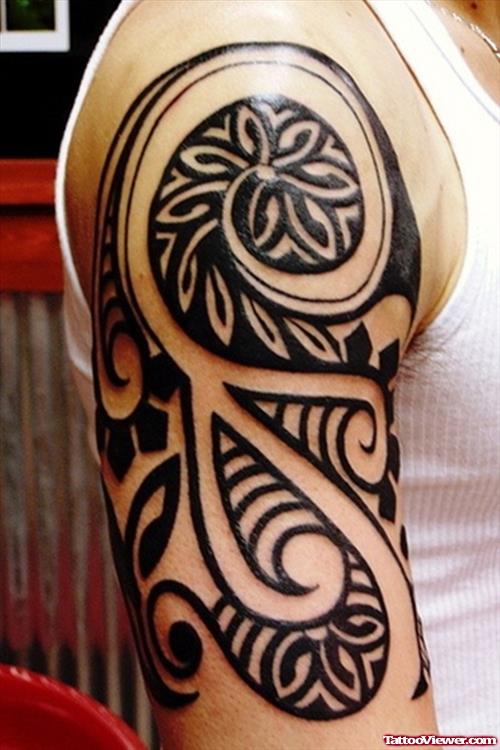 Black Tribal Hawaiian Tattoo On Man Right Half Sleeve