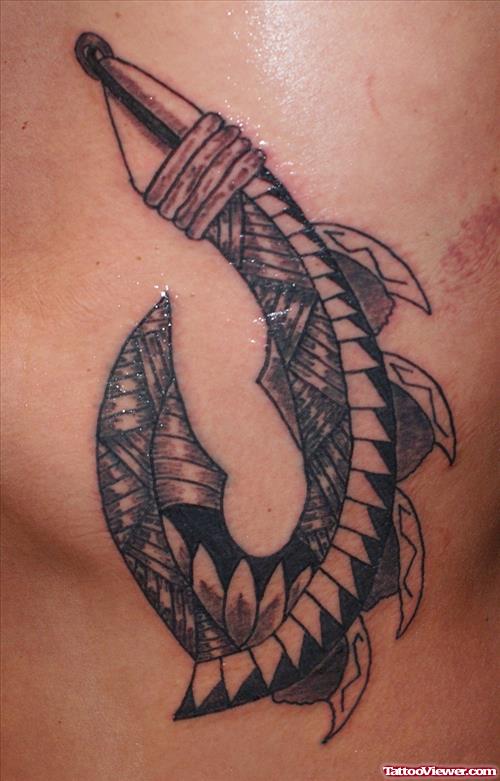 Grey Ink Hawaiian Tattoo On Side