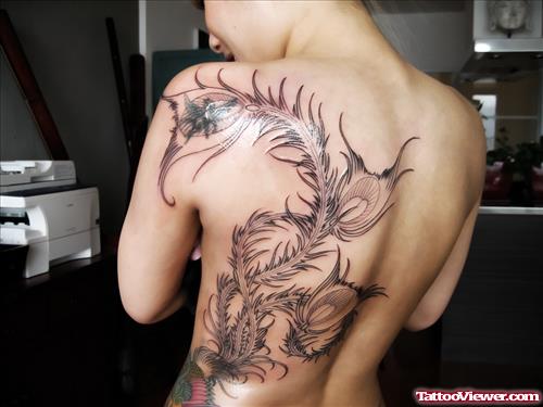 Grey Ink Hawaiian Tattoo On Girl Back