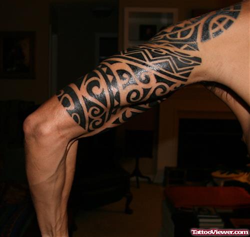 Attractive Hawaiian Tattoo On Left Sleeve