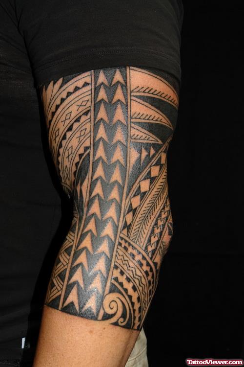 Tribal Hawaiian Tattoo On Left Sleeve