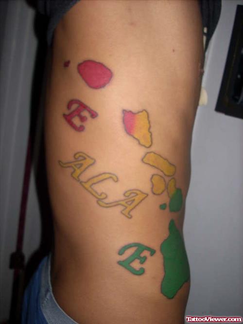 Colored Hawaiian Tattoos On Man Side Rib