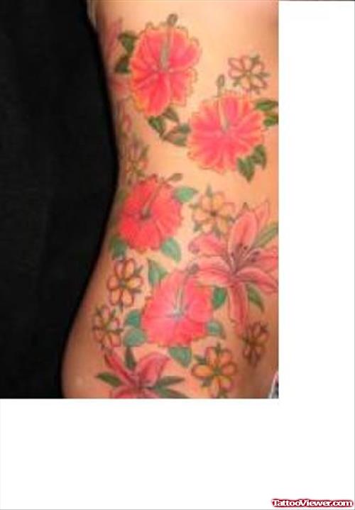Color Flowers Hawaiian Tattoo On Side Rib
