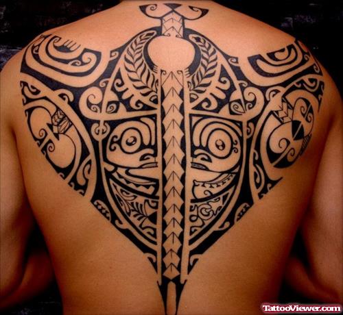 Attractive Tribal Hawaiian Tattoo On Man Upperback