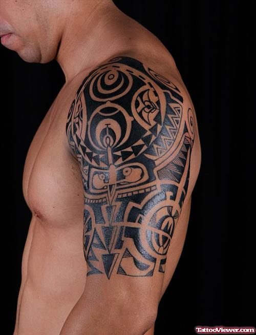 Nice Hawaiian Tattoo On Left Half Sleeve