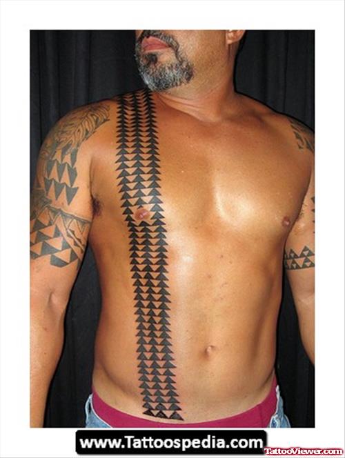 Hawaiian Tattoo On Man Chest And Half Sleeve