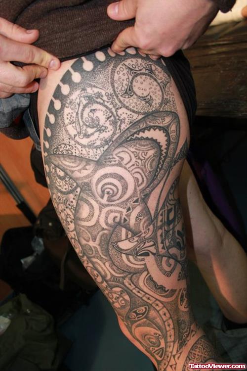 Grey Ink Tribal Hawaiian Tattoo On Left Leg
