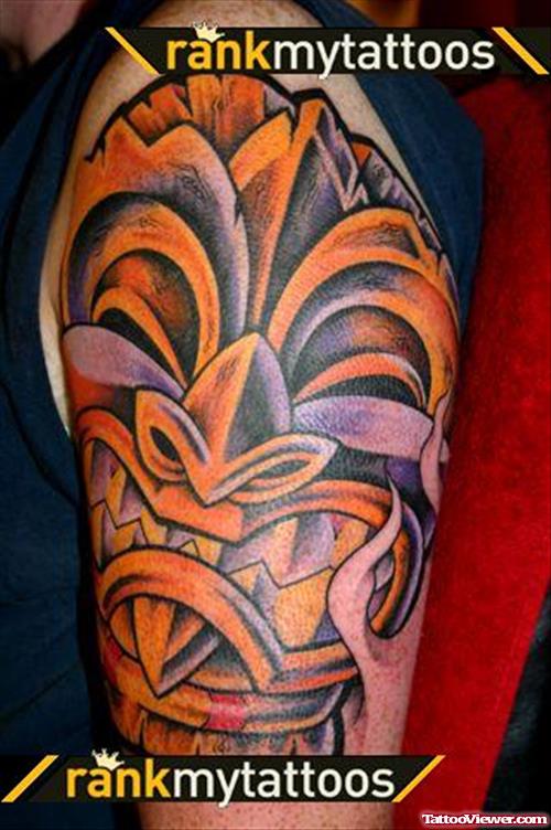 Color Ink Hawaiian Tattoo On Left Half Sleeve