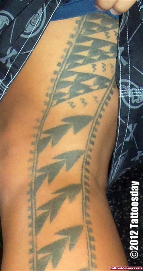 Attractive Grey Ink Hawaiian Tattoo On Side Rib
