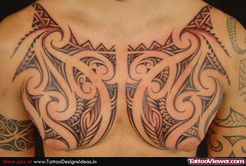 Grey Ink Hawaiian Tribal Tattoo On Man Chest