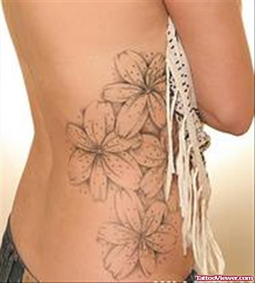 Grey Ink Flowers Hawaiian Tattoo On Side