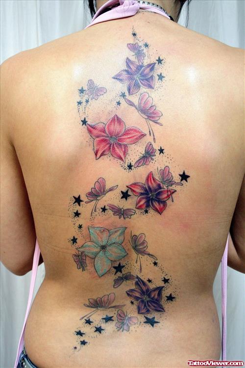 Colored Hawaiian Flowers And Butterflies Tattoo On Back