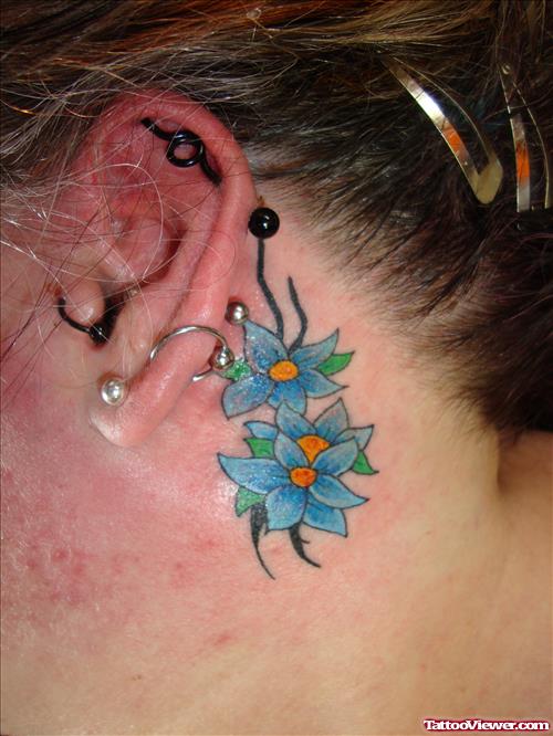 Blue Flowers Hawaiian Tattoo Behind Ear