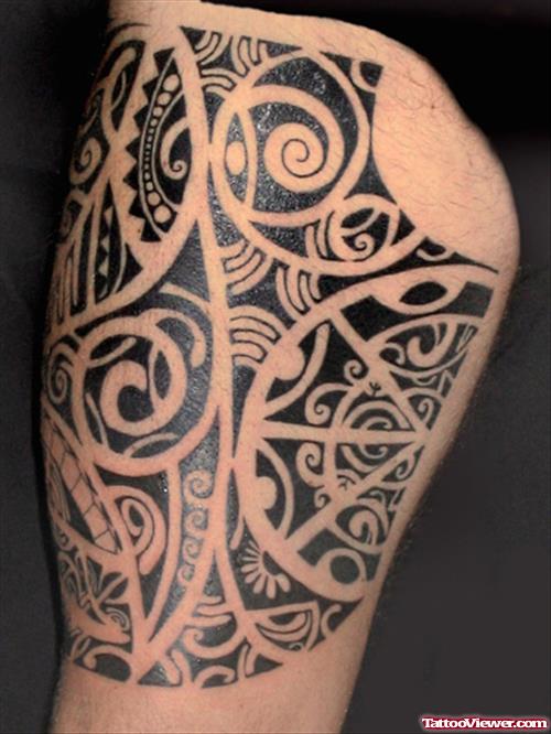 Black Ink Tribal Hawaiian Tattoo On Biceps