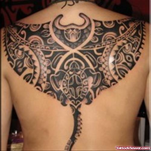 Black Ink Hawaiian Tattoo On Upperback