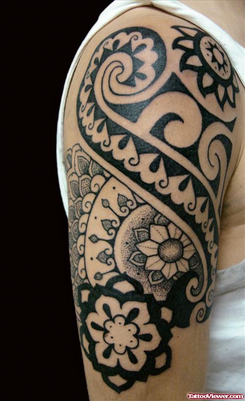 Black Ink Hawaiian Tattoo On Man Right Half Sleeve