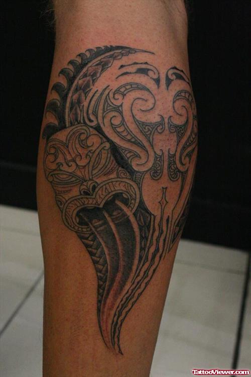 Grey Ink Hawaiian Tattoo On Arm For Men