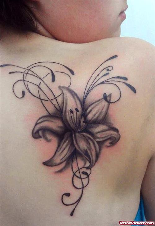 Grey Ink Hawaiian Flower Tattoo On Right Back Shoulder