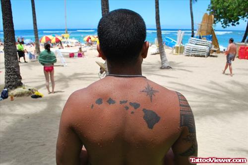 Black Ink Hawaiian Island Tattoo On Man Upperback