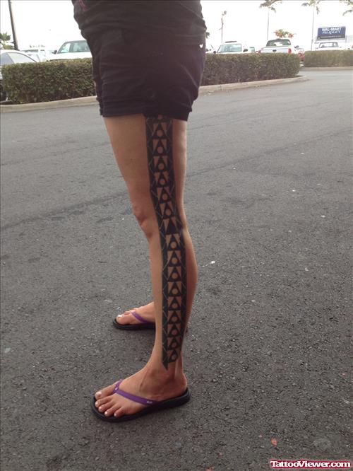 Awesome Black Tribal Tattoo On Man Left Leg
