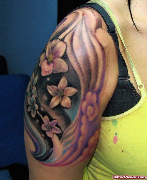 Amazing Hawaiian Flowers Tattoo On Right Shoulder