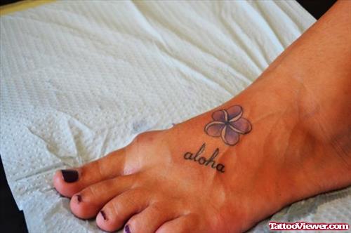Hawaiian Flower Tattoo On Left Foot