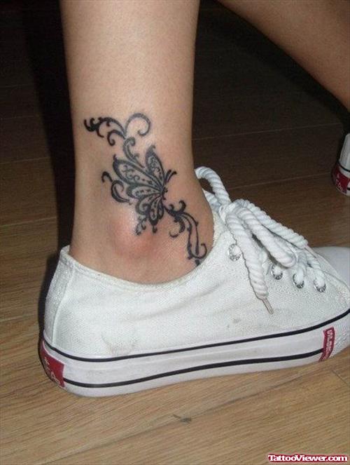 Grey Ink Hawaiian Butterfly Tattoos On Leg
