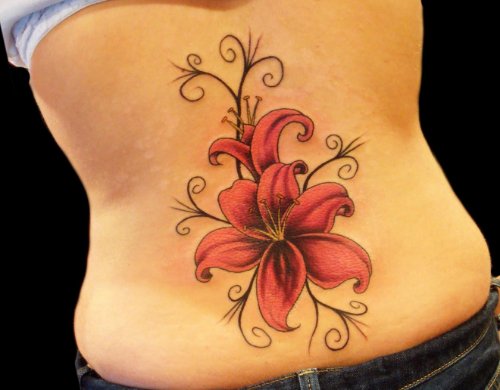 Hawaiian Flower Tattoo On Lowerback