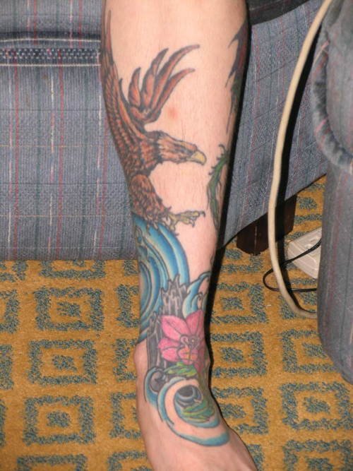 Color Flower and Hawk Tattoo On Left Leg