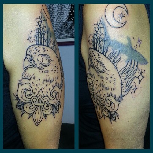 Grey Ink Hawk Head And Moon Tattoo On Bicep
